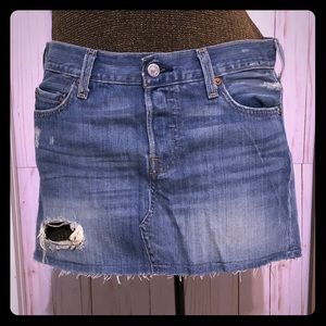 Levi’s 501 button fly distressed jean mini skirt